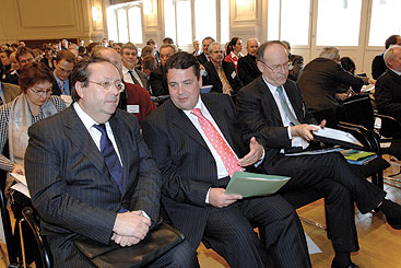 a group of people sitting in chairs