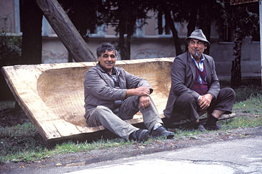 a man sitting on a bench