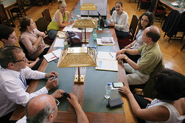 a group of people sitting at a table