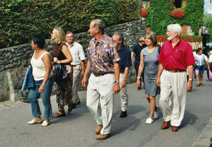 a group of people standing in front of a crowd