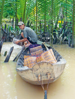 a man sitting on a boat