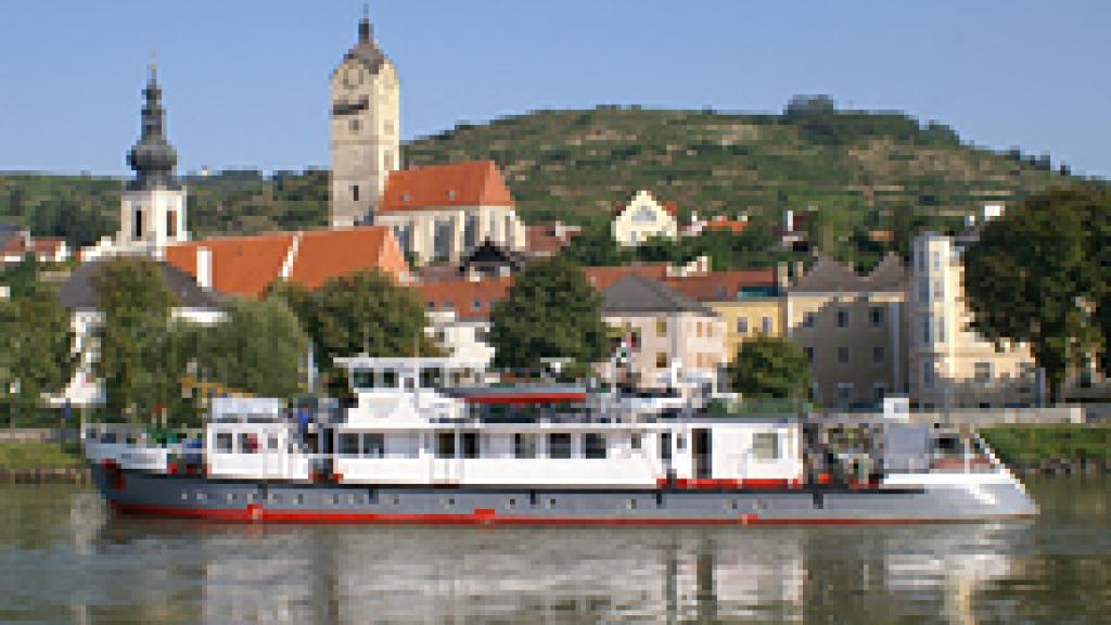 a small boat in a large body of water