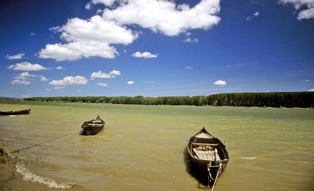 a small boat in a body of water