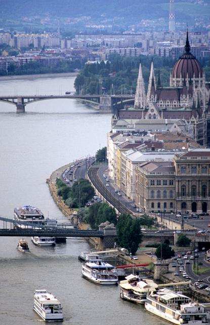 a bridge over a river in a city