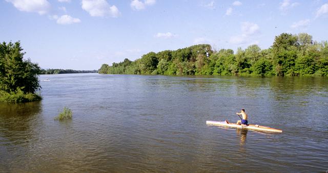 a small boat in a body of water