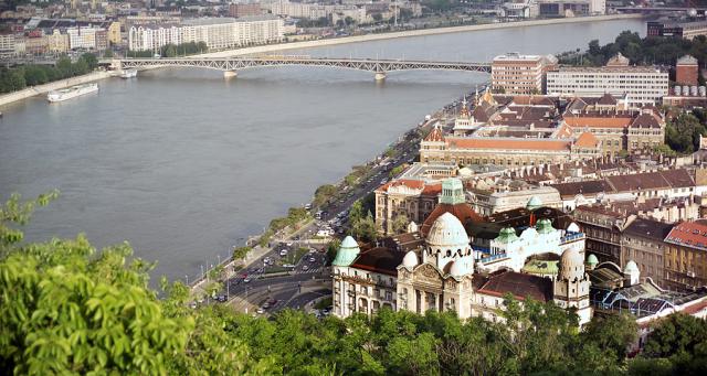 a river with a city in the background