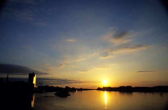 a sunset over a body of water