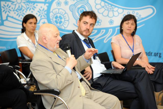 a group of people sitting in chairs