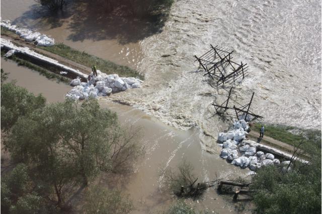 Dam broken by flooding water