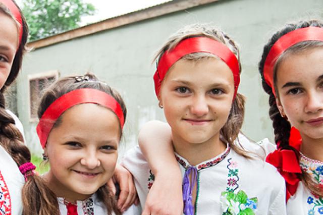 Four young girls in traditional dress